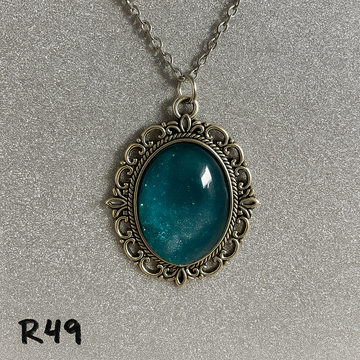 Deep Sea Aqua Resin Pendant in Antique Silver Frame R49