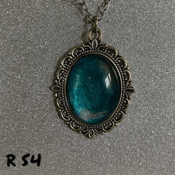 Vibrant Teal Glitter Cabochon Pendant in Ornate Bronze Setting R54