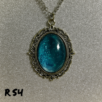 Intense Aqua Blue Glitter Pendant in Antique Silver Frame R54